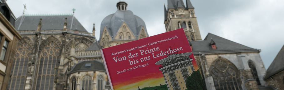 Aachens kunterbunte Unternehmenswelt - Von der Printe bis zur Lederhose, von Kiki Bragard, hier vor dem Aachener Dom